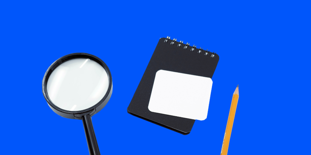 Magnifying glass, notebook, and pencil on a blue background, representing a focused approach to understanding and responding to client needs.