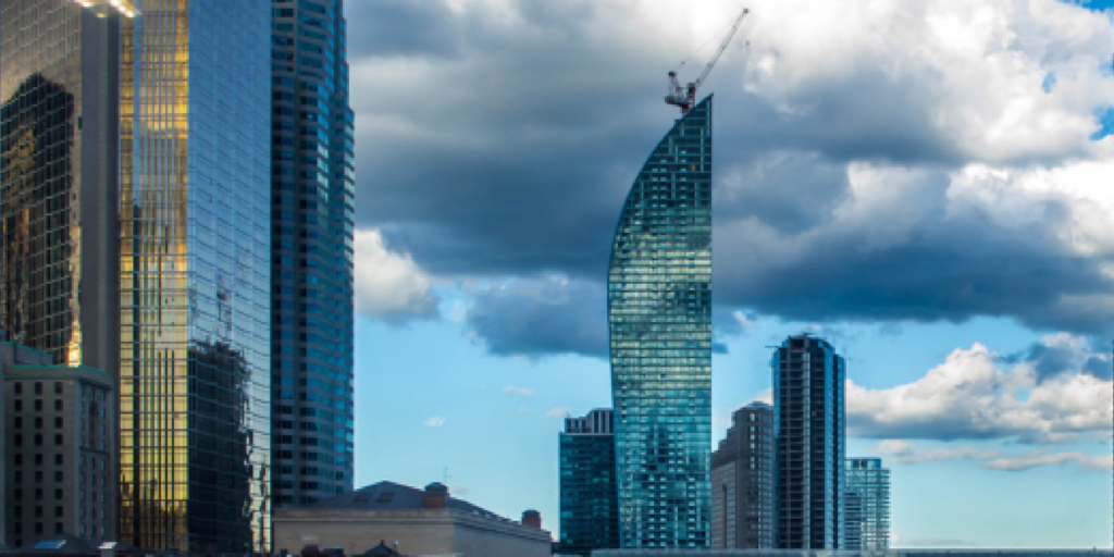 Buildings clustered together symbolizing delicate business relationships.