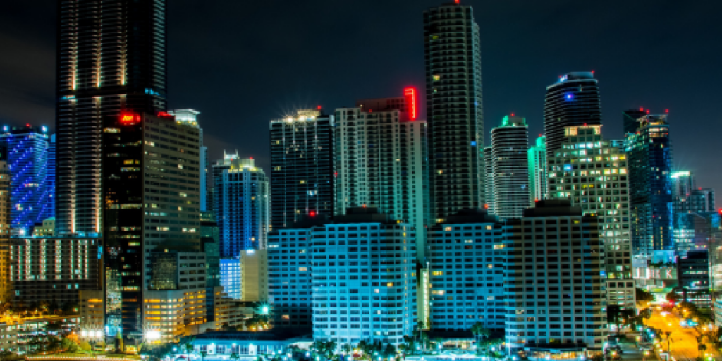 Buildings clustered together symbolizing delicate business relationships.