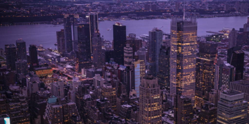 Buildings clustered together symbolizing delicate business relationships.