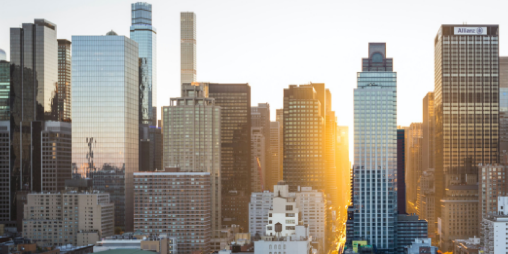 Buildings clustered together symbolizing delicate business relationships.