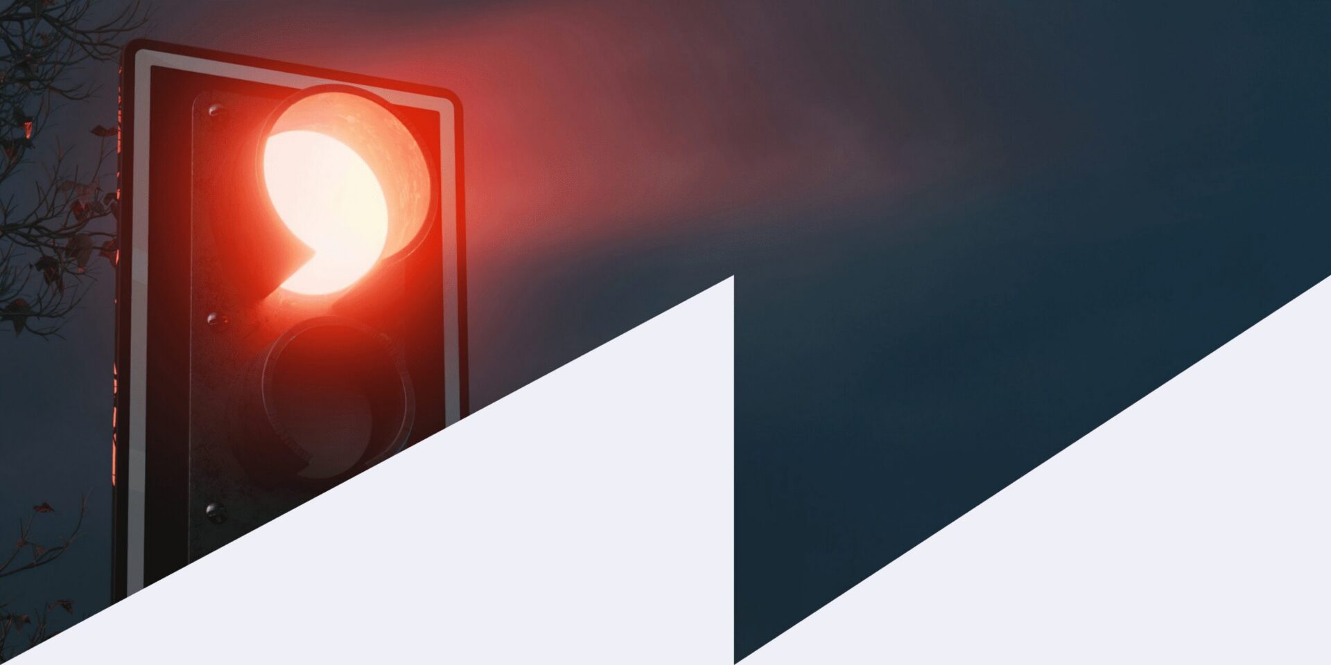 Red stoplight signaling a pause or halt, symbolizing the importance of caution and security in ID verification processes.
